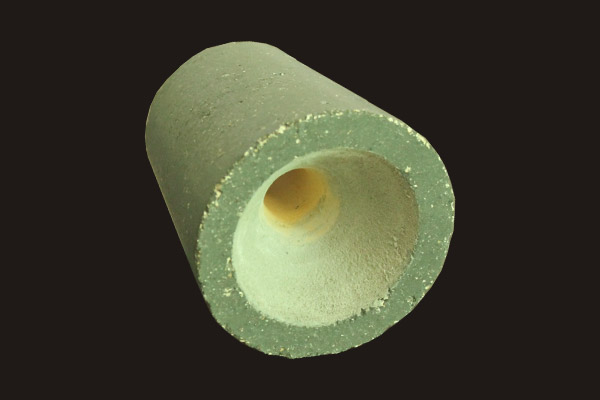 Metallurgical flow control tundish inlaid with zirconia core aluminum carbon outsourcing nozzle